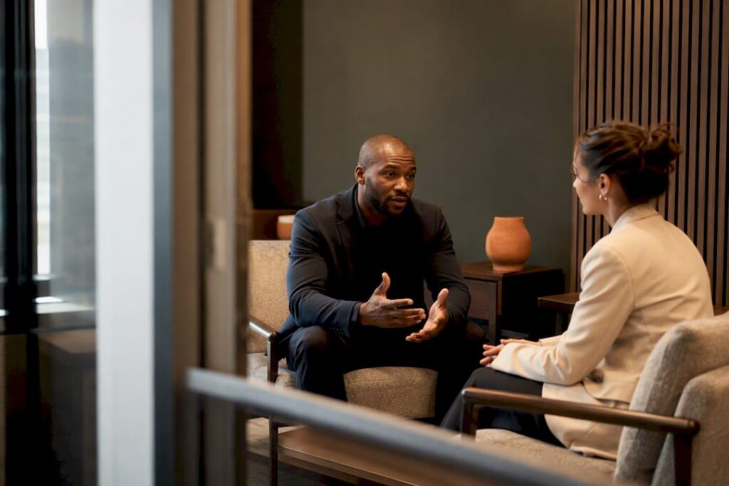Colleagues having a calm accountability conversation