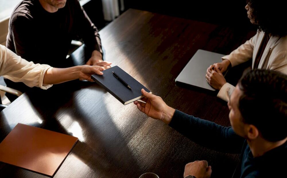Team rotating shared administrative responsibilities