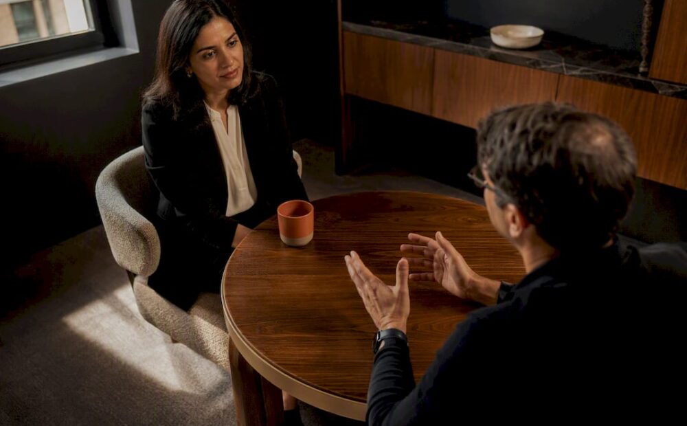 Woman listening during workplace feedback