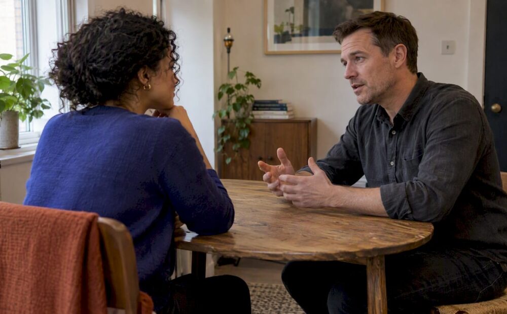 Manager and employee in one-on-one conversation