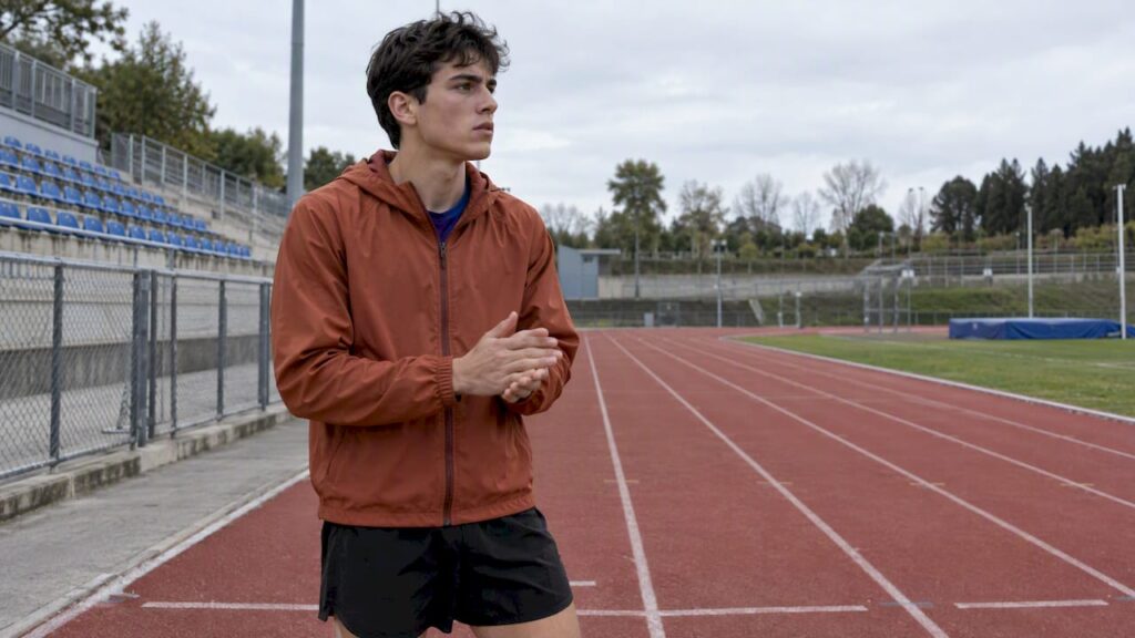 Runner pausing nervously before a race