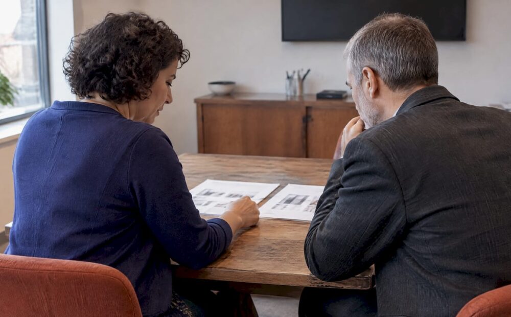 Teacher and manager reviewing work quality evidence